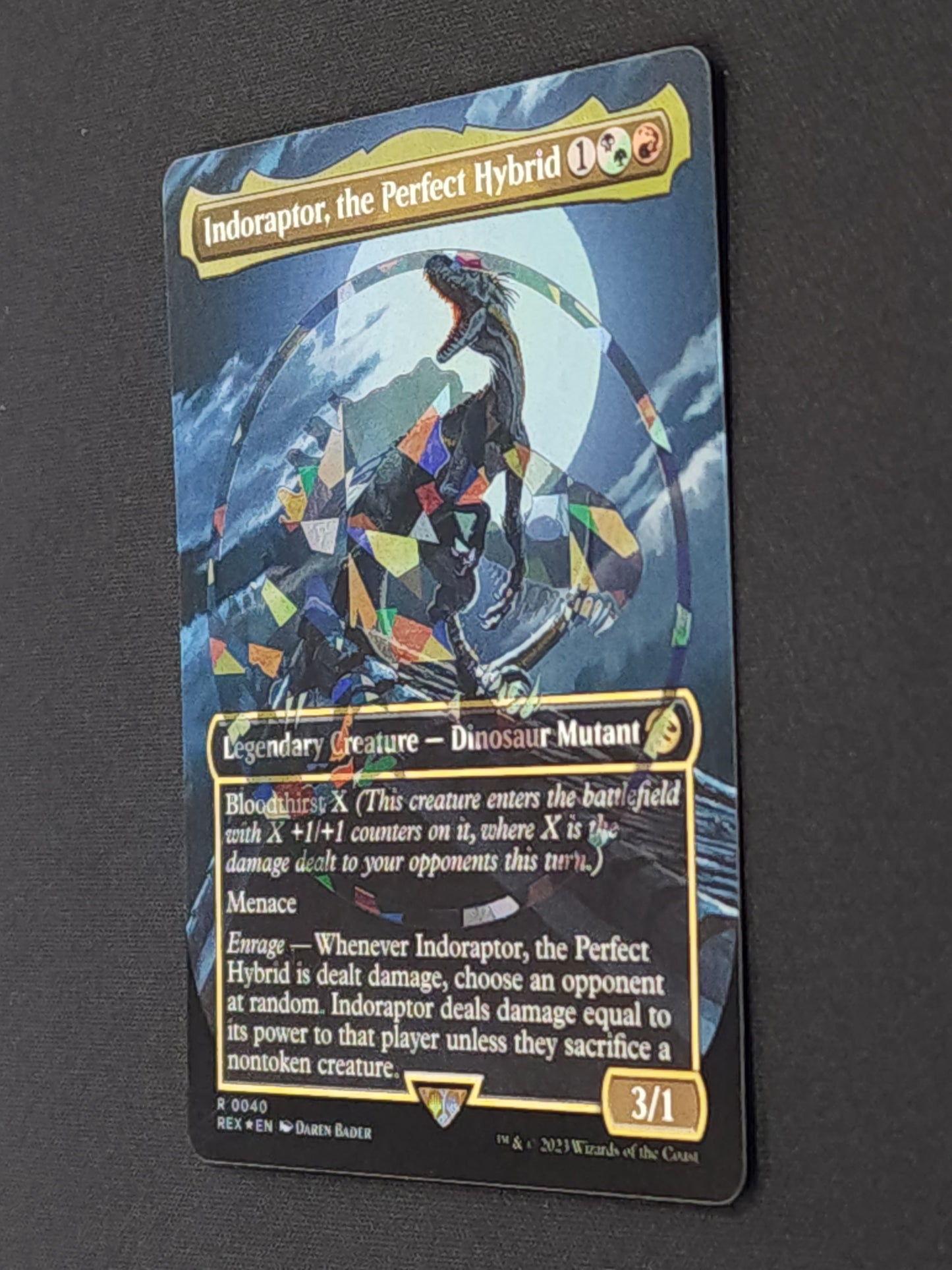 Indoraptor, the Perfect Hybrid (Borderless) (Emblem)